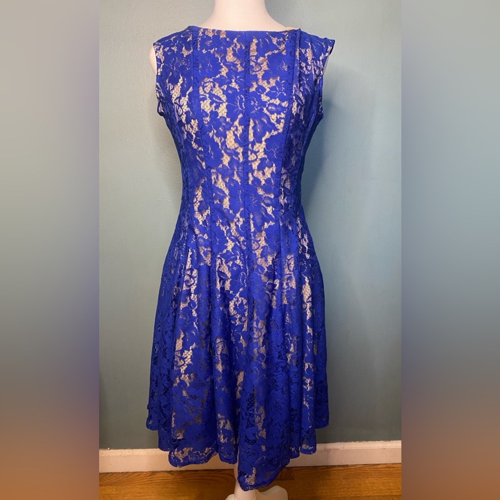 Sleeveless blue lace dress with tan lining size 4